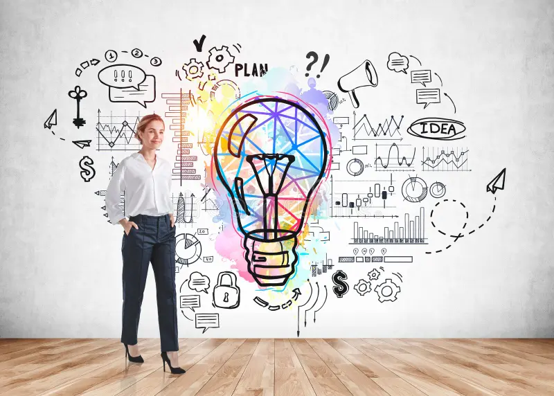 businesswoman wearing white shirt walking around room concrete wall colourful sketch light bulb icons cogwheel 226547194